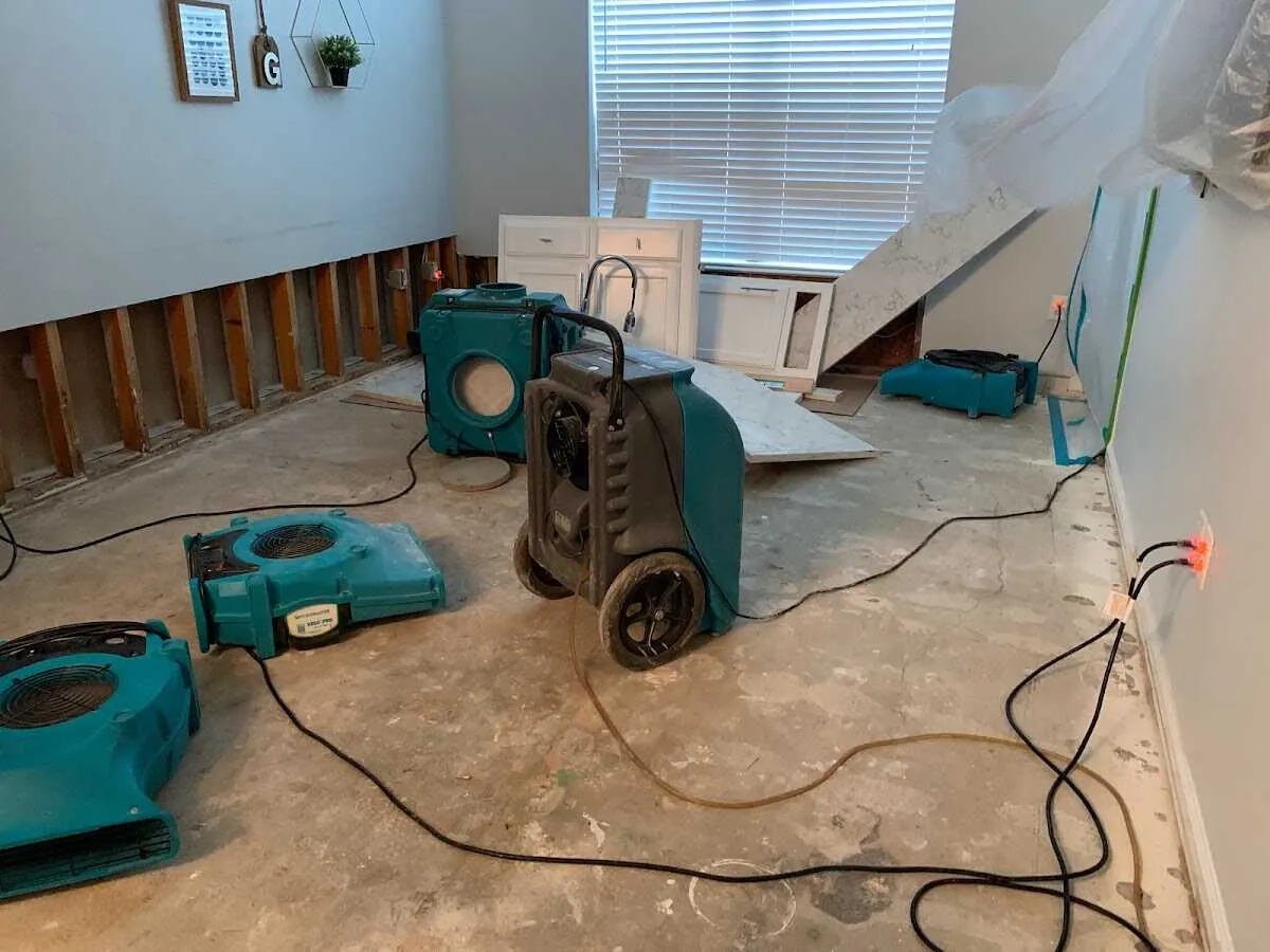 Dehumidifier in flood-cut room for Water Damage Restoration in Long Branch