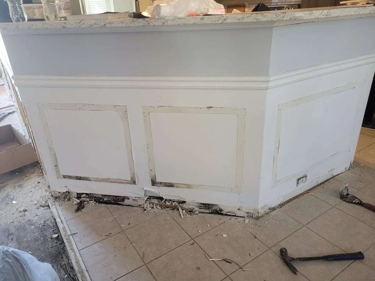 Water damage and mold on kitchen during Storm Damage Restoration in Long Branch